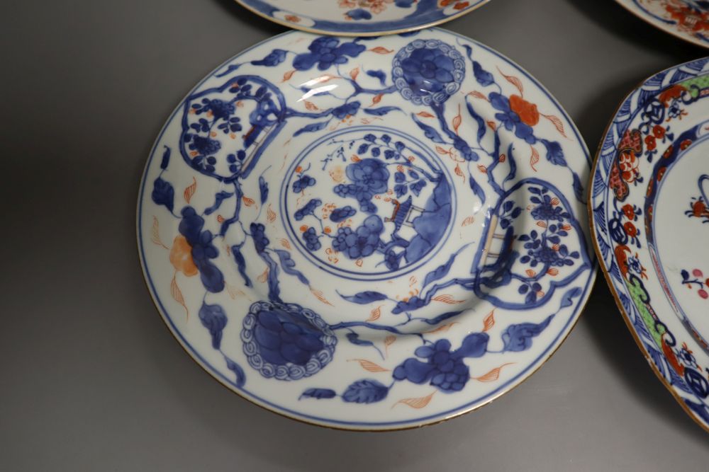Four 18th century Chinese Imari dishes, 22.5cm, painted underglaze in typical palette